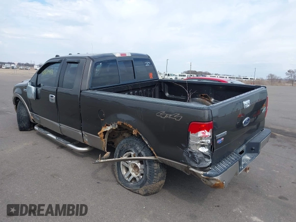 2005 Ford F-150 XLT with VIN 1FTPX14515NA43732, listed as a IAAI auction lot 41901453 with 216,729 mi miles. Bid and sale history available at carsss.com. Image 3.