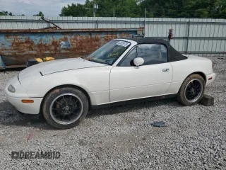 1994 Mazda MX-5 Miata with VIN JM1NA3536R0507358, listed as a Copart auction lot 63829975 with 76,569 mi miles and Salvage title. Bid and sale history available at DreamBid. Image 1.