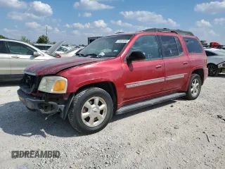 2002 GMC Envoy SLT with VIN 1GKES16S526121741, listed as a Copart auction lot 71957034 with 276,328 mi miles and Salvage Title. Bid and sale history available at DreamBid. Image 1.