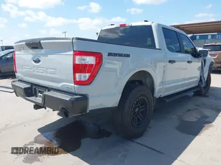 2023 Ford F-150 XL with VIN 1FTFW1E84PFA48461, listed as a IAAI auction lot 42096361 with 52,354 mi miles and . Bid and sale history available at DreamBid. Image 4.