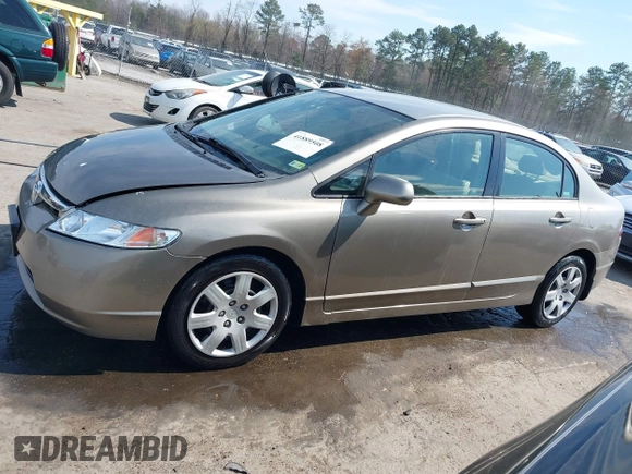 2006 Honda Civic LX with VIN 2HGFA16596H514483, listed as a IAAI auction lot 41889508 with 148,412 mi miles and . Bid and sale history available at DreamBid. Image 14.