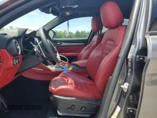 2018 Alfa Romeo Stelvio Ti Sport z VIN ZASFAKNN8J7B86006, wystawiony jako Copart lot #55559705 z przebiegiem 48 588 mil mil oraz Szkoda całkowita • Salvage title. Historia ofert i sprzedaży dostępna na DreamBid. Obrazek 7.