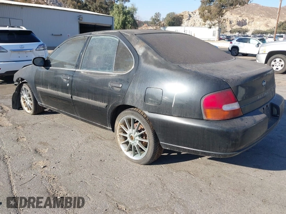 1998 Nissan Altima XE with VIN 1N4DL01D0WC237630, listed as a IAAI auction lot 41297277 with 101,965 mi miles. Bid and sale history available at carsss.com. Image 3.