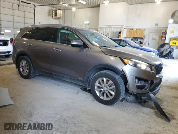 2017 Kia Sorento LX z VIN 5XYPGDA33HG293392, wystawiony jako Copart lot #62642604 z przebiegiem 73 242 mil mil oraz Szkoda całkowita • Salvage title. Historia ofert i sprzedaży dostępna na DreamBid. Obrazek 4.