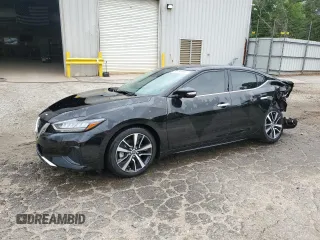 2023 Nissan Maxima SV with VIN 1N4AA6CV1PC501974, listed as a Copart auction lot 54169865 with 21,390 mi miles and Salvage title. Bid and sale history available at DreamBid. Image 1.