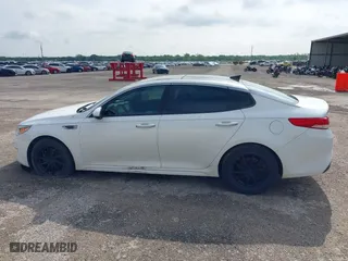 2016 Kia Optima EX with VIN 5XXGU4L38GG013197, listed as a IAAI auction lot 42125301 with 110,128 mi miles. Bid and sale history available at carsss.com. Image 14.
