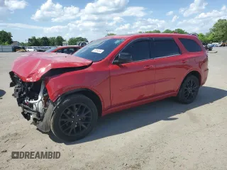 2016 Dodge Durango SXT with VIN 1C4RDJAG2GC460234, listed as a Copart auction lot 57934544 with 101,387 mi miles and Salvage title. Bid and sale history available at DreamBid. Image 1.