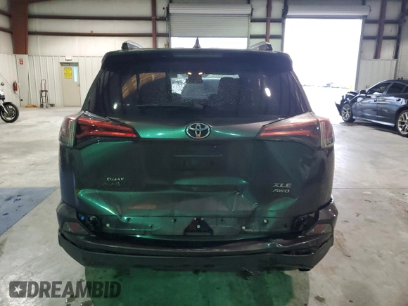 2016 Toyota RAV4 XLE with VIN 2T3RFREV3GW423028, listed as a Copart auction lot 63466735 with 164,207 mi miles and Salvage title. Bid and sale history available at DreamBid. Image 6.