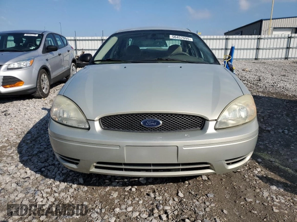 2005 Ford Taurus SE with VIN 1FAFP53U95A101336, listed as a Copart auction lot 56457095 with 127,656 mi miles and Salvage title. Bid and sale history available at DreamBid. Image 5.