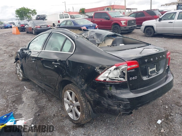 2016 Volvo S60 T5 Premier z VIN YV1612TK3G2411949, wystawiony jako IAAI lot #42353357 z przebiegiem 152 937 mil mil oraz . Historia ofert i sprzedaży dostępna na DreamBid. Obrazek 13.