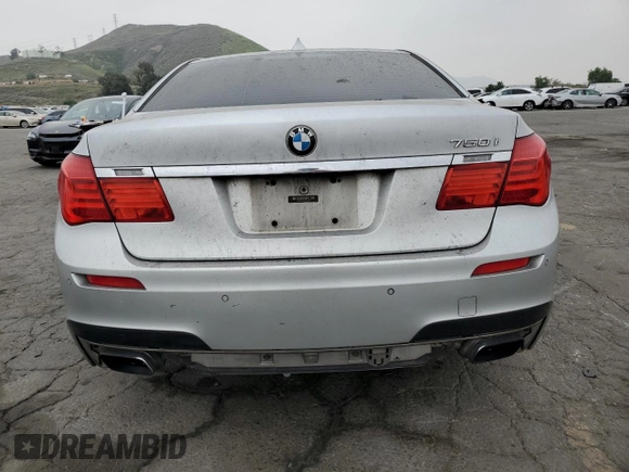 2012 BMW 7 Series 750i z VIN WBAKA8C5XCCY37933, wystawiony jako Copart lot #53122875 z przebiegiem Nie podano mil oraz Nie do naprawy • Non repairable. Historia ofert i sprzedaży dostępna na DreamBid. Obrazek 6.