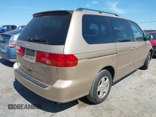2001 Honda Odyssey EX with VIN 2HKRL18681H530346, listed as a IAAI auction lot 42371126 with 211,604 mi miles and . Bid and sale history available at DreamBid. Image 4.