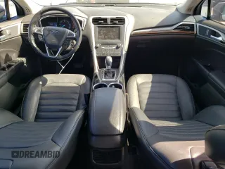 2013 Ford Fusion SE Hybrid z VIN 3FA6P0LUXDR362711, wystawiony jako Copart lot #57060425 z przebiegiem 155 031 mil mil oraz Szkoda całkowita • Salvage title. Historia ofert i sprzedaży dostępna na DreamBid. Obrazek 8.