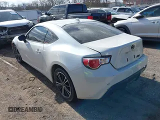 2015 Scion FR-S with VIN JF1ZNAA13F8707454, listed as a IAAI auction lot 41239233 with 130,126 mi miles. Bid and sale history available at carsss.com. Image 3.