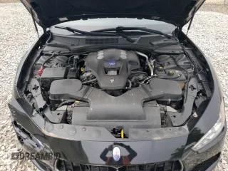 2014 Maserati Ghibli S Q4 z VIN ZAM57RTA8E1083877, wystawiony jako Copart lot #57812725 z przebiegiem 94 088 mil mil oraz Czysty tytuł • Clean title. Historia ofert i sprzedaży dostępna na DreamBid. Obrazek 11.