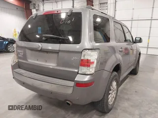 2008 Mercury Mariner Premier z VIN 4M2CU87108KJ15433, wystawiony jako IAAI lot #41924055 z przebiegiem 168 569 mil mil oraz . Historia ofert i sprzedaży dostępna na DreamBid. Obrazek 4.