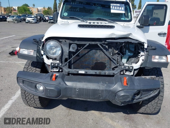 2022 Jeep Gladiator Mojave z VIN 1C6JJTEG0NL103523, wystawiony jako IAAI lot #41842011 z przebiegiem 36 160 mil mil oraz . Historia ofert i sprzedaży dostępna na DreamBid. Obrazek 6.