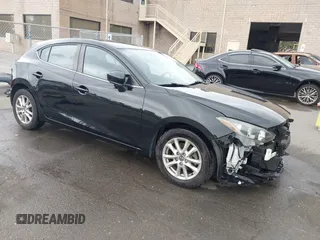 2014 Mazda 3 i Touring with VIN JM1BM1L73E1172987, listed as a IAAI auction lot 42111043 with 121,168 mi miles and . Bid and sale history available at DreamBid. Image 1.