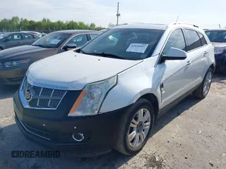 2011 Cadillac SRX Performance Collection with VIN 3GYFNBEYXBS540807, listed as a IAAI auction lot 42034047 with 198,429 mi miles. Bid and sale history available at carsss.com. Image 17.