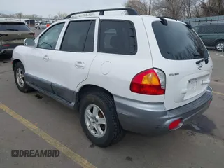 2004 Hyundai Santa Fe GLS with VIN KM8SC13DX4U609921, listed as a IAAI auction lot 41619492 with 113,592 mi miles. Bid and sale history available at carsss.com. Image 3.