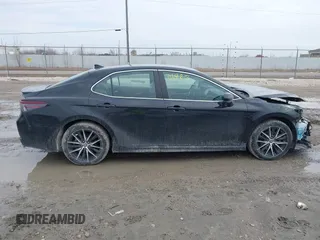 2021 Toyota Camry SE Nightshade with VIN 4T1G11AK4MU573284, listed as a IAAI auction lot 41701923 with 130,160 mi miles. Bid and sale history available at carsss.com. Image 14.