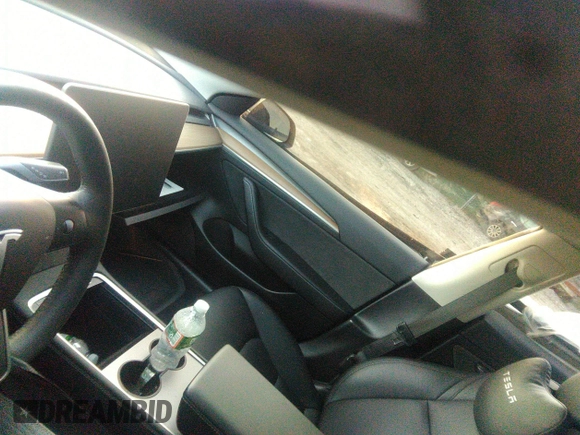 2023 Tesla Model 3 z VIN 5YJ3E1EA3PF449187, wystawiony jako IAAI lot #40320939 z przebiegiem Nie podano mil oraz . Historia ofert i sprzedaży dostępna na DreamBid. Obrazek 15.