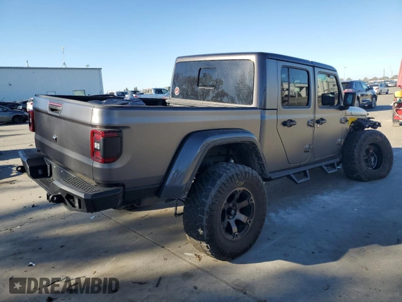2021 Jeep Gladiator Rubicon с VIN 1C6JJTBM4ML594204, выставлен на аукционе Copart как лот 83998224 с пробегом 25 852 миль миль и Списание • Salvage title. История ставок и продаж доступна на DreamBid. Изображение 3.