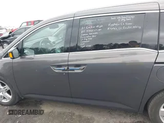 2012 Honda Odyssey Touring with VIN 5FNRL5H99CB071010, listed as a IAAI auction lot 41651233 with 186,913 mi miles. Bid and sale history available at carsss.com. Image 15.
