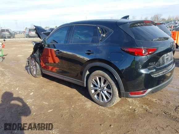 2021 Mazda CX-5 Grand Touring with VIN JM3KFBDM0M1357587, listed as a IAAI auction lot 41680245 with 1 mi miles. Bid and sale history available at carsss.com. Image 3.