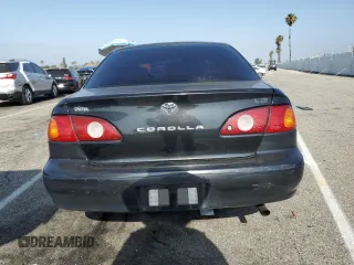 2002 Toyota Corolla CE с VIN 1NXBR12EX2Z586078, выставлен на аукционе Copart как лот 61500045 с пробегом Не указан миль и Списание • Salvage title. История ставок и продаж доступна на DreamBid. Изображение 6.