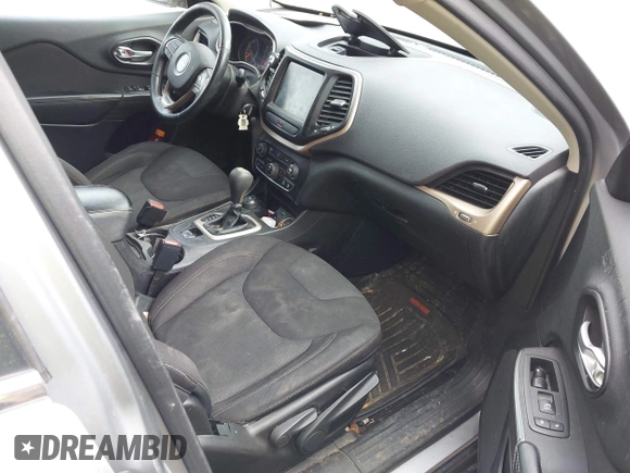 2016 Jeep Cherokee Latitude with VIN 1C4PJMCB7GW252724, listed as a IAAI auction lot 41869060 with 125,119 mi miles. Bid and sale history available at carsss.com. Image 5.
