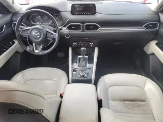 2018 Mazda CX-5 Grand Touring с VIN JM3KFBDM1J0332117, выставлен на аукционе Copart как лот 59379085 с пробегом 95 527 миль миль и Списание • Salvage title. История ставок и продаж доступна на DreamBid. Изображение 8.