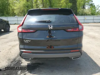 2023 Honda CR-V Sport with VIN 2HKRS6H56PH812484, listed as a Copart auction lot 55608005 with 46,064 mi miles and Salvage Title. Bid and sale history available at DreamBid. Image 6.