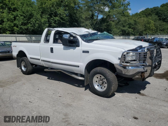 1999 Ford Super Duty F-250 XL with VIN 1FTNX21F3XEA71139, listed as a Copart auction lot 67062114 with 203,233 mi miles and Salvage Title. Bid and sale history available at carsss.com. Image 4.