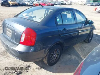 2009 Hyundai Accent Auto GLS with VIN KMHCN46C79U286647, listed as a IAAI auction lot 41748009 with 154,492 mi miles. Bid and sale history available at carsss.com. Image 4.