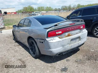 2013 Dodge Charger RT with VIN 2C3CDXCT4DH604611, listed as a IAAI auction lot 42196201 with 211,873 mi miles and . Bid and sale history available at carsss.com. Image 3.