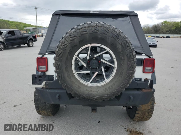 2018 Jeep Wrangler Unlimited Sport with VIN 1C4BJWDG8JL883524, listed as a Copart auction lot 52830295 with 63,659 mi miles and Salvage Title. Bid and sale history available at DreamBid. Image 6.