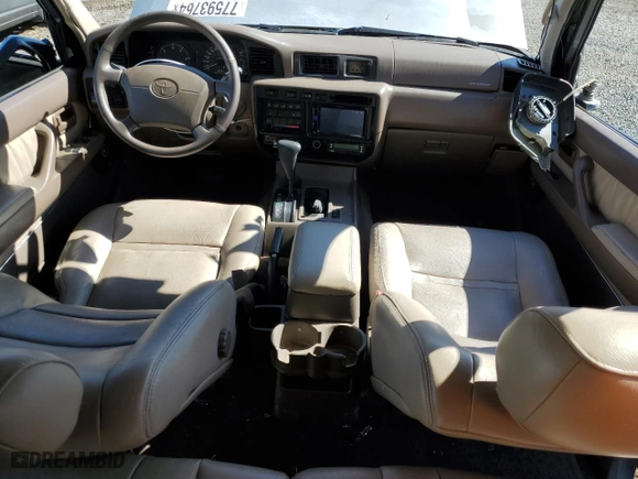 1996 Toyota Land Cruiser with VIN JT3HJ85J0T0145838, listed as a Copart auction lot 77593764 with 158,507 mi miles and Salvage Title. Bid and sale history available at carsss.com. Image 8.