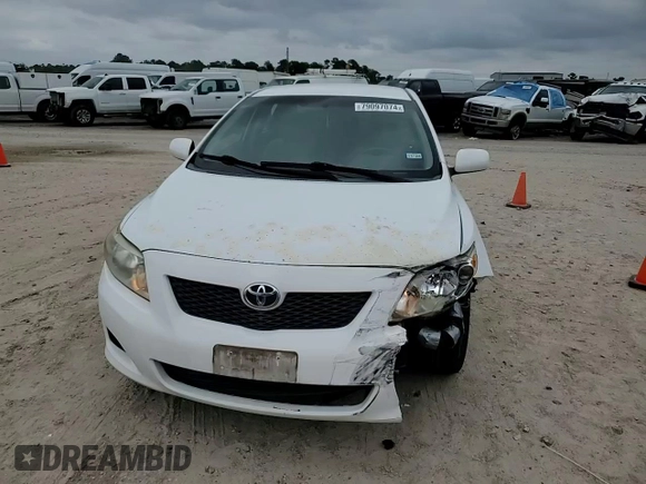 2010 Toyota Corolla with VIN 1NXBU4EE7AZ256666, listed as a Copart auction lot 79097074 with 65,537 mi miles and Salvage title. Bid and sale history available at DreamBid. Image 11.