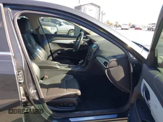 2014 Cadillac ATS Premium with VIN 1G6AE5SX4E0106197, listed as a IAAI auction lot 41720184 with 106,919 mi miles. Bid and sale history available at carsss.com. Image 5.