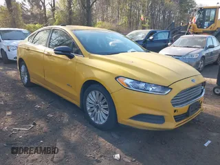 2015 Ford Fusion SE Hybrid with VIN 3FA6P0LU5FR255505, listed as a IAAI auction lot 42104362 with 399,115 mi miles. Bid and sale history available at carsss.com. Image 1.