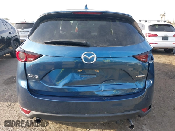 2021 Mazda CX-5 Touring with VIN JM3KFACM5M0332718, listed as a IAAI auction lot 41905933 with 30,930 mi miles. Bid and sale history available at carsss.com. Image 17.