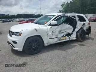 2018 Jeep Grand Cherokee Laredo E with VIN 1C4RJEAG7JC171390, listed as a Copart auction lot 59025325 with 112,032 mi miles and Salvage title. Bid and sale history available at DreamBid. Image 1.
