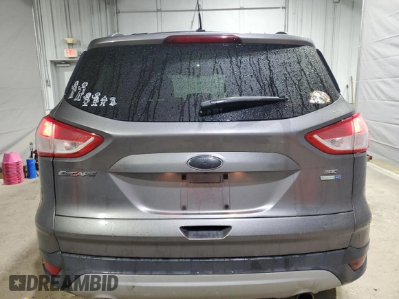 2013 Ford Escape SE z VIN 1FMCU9G98DUB42469, wystawiony jako Copart lot #55455265 z przebiegiem 151 975 mil mil oraz Szkoda całkowita • Salvage title. Historia ofert i sprzedaży dostępna na DreamBid. Obrazek 6.