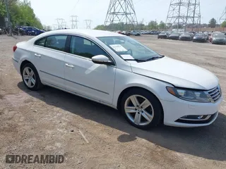 2013 Volkswagen CC Sport with VIN WVWBP7AN0DE523261, listed as a IAAI auction lot 42106039 with 136,105 mi miles. Bid and sale history available at carsss.com. Image 1.