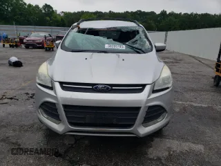 2013 Ford Escape SE with VIN 1FMCU0GX7DUB00465, listed as a Copart auction lot 58265705 with 227,613 mi miles and Salvage title. Bid and sale history available at DreamBid. Image 5.