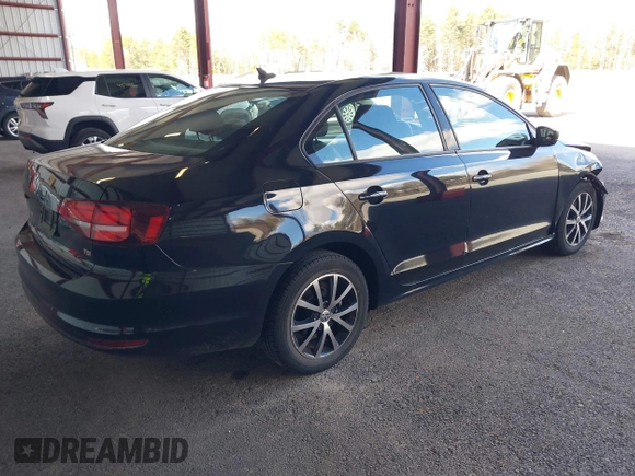 2016 Volkswagen Jetta Sedan 1.4T SE with VIN 3VWD67AJ8GM316539, listed as a IAAI auction lot 41870438 with 114,432 mi miles. Bid and sale history available at carsss.com. Image 4.