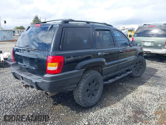 2001 Jeep Grand Cherokee Laredo with VIN 1J4GW48N61C642351, listed as a IAAI auction lot 41783127 with 194,578 mi miles and . Bid and sale history available at DreamBid. Image 4.