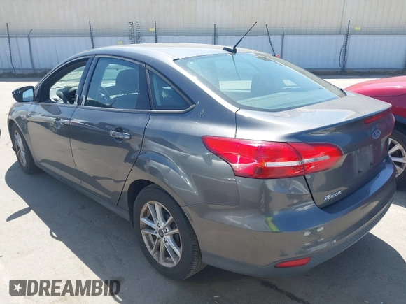 2017 Ford Focus SE z VIN 1FADP3F26HL308880, wystawiony jako IAAI lot #41991909 z przebiegiem 103 403 mil mil oraz . Historia ofert i sprzedaży dostępna na DreamBid. Obrazek 3.