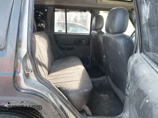 2000 Jeep Cherokee Classic with VIN 1J4FF58SXYL215871, listed as a IAAI auction lot 41855165 with 132,284 mi miles. Bid and sale history available at carsss.com. Image 8.